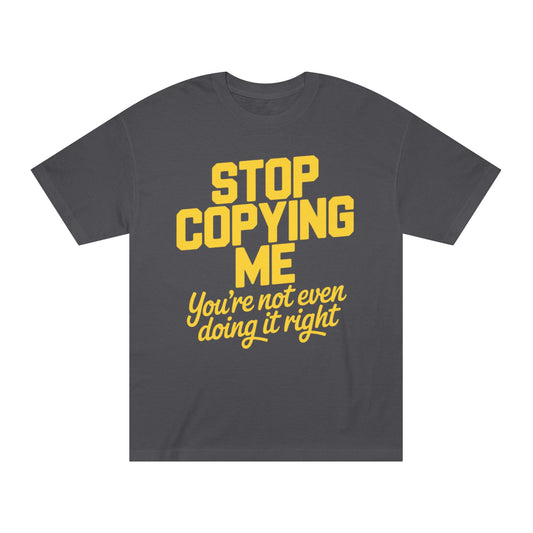 Graphic Tee — "Stop Copying Me, You're Not Even Doing It Right" Bold Yellow Slogan